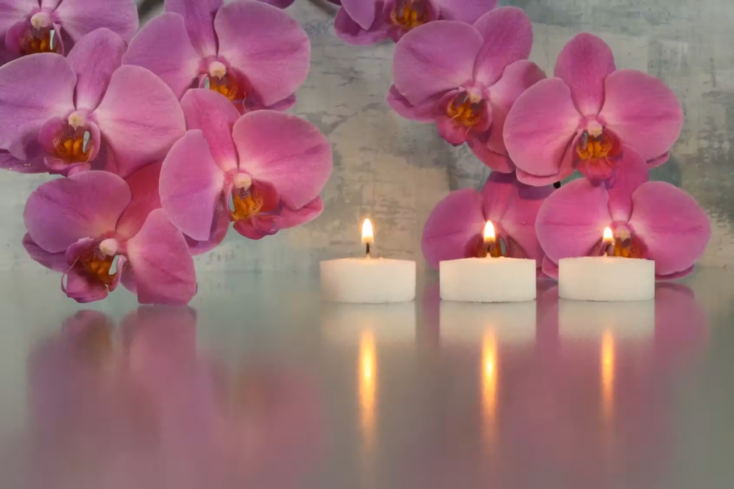 Kerzen mit Orchideen